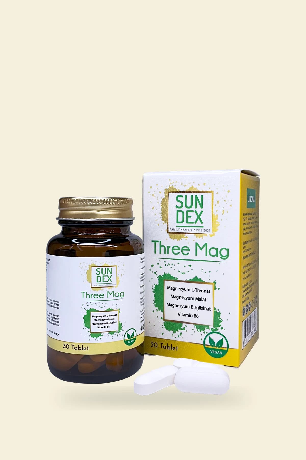 SUNDEX Three Mag şişesi, kutusu ve iki tablet